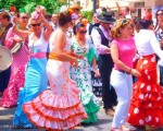 Dancing Sevillanas, La Hermandad de El Rocío. The Brotherhood of El Rocío. Back after their yearly Pilgrimage to El Rocío in Huelva.  www,spanishsosimple.com