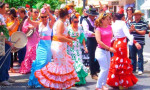 Dancing Sevillanas, La Hermandad de El Rocío. The Brotherhood of El Rocío. Back after their yearly Pilgrimage to El Rocío in Huelva.  www,spanishsosimple.com