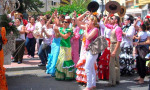 Dancing and singing Sevillanas. La Hermandad de El Rocío. The Brotherhood of El Rocío. Back after their yearly Pilgrimage to El Rocío in Huelva.  www,spanishsosimple.com