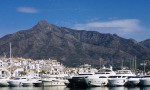 La Concha mountain behind Marbella, Puerto Banús in the foreground. www.spanishsosimple.com